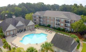 Apartments in Fayetteville, North Carolina - Aerial View of Swimming Pool and Surrounding Buildings
