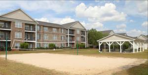Apartments in Fayetteville, North Carolina - Outdoor Volleyball Court and Gazebo
