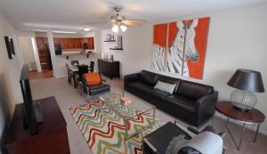 One Bedroom Apartments in Fayetteville NC - Model Living Room with Views to Dining Room and Kitchen